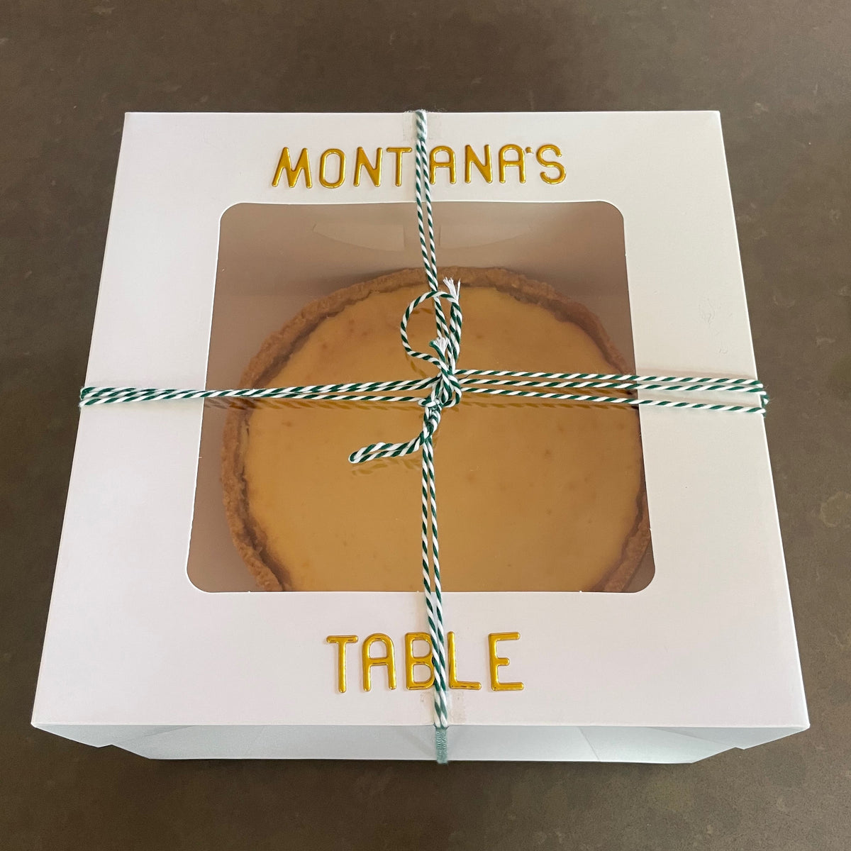 Montana's Table baked cheesecake boxed and ready for pickup