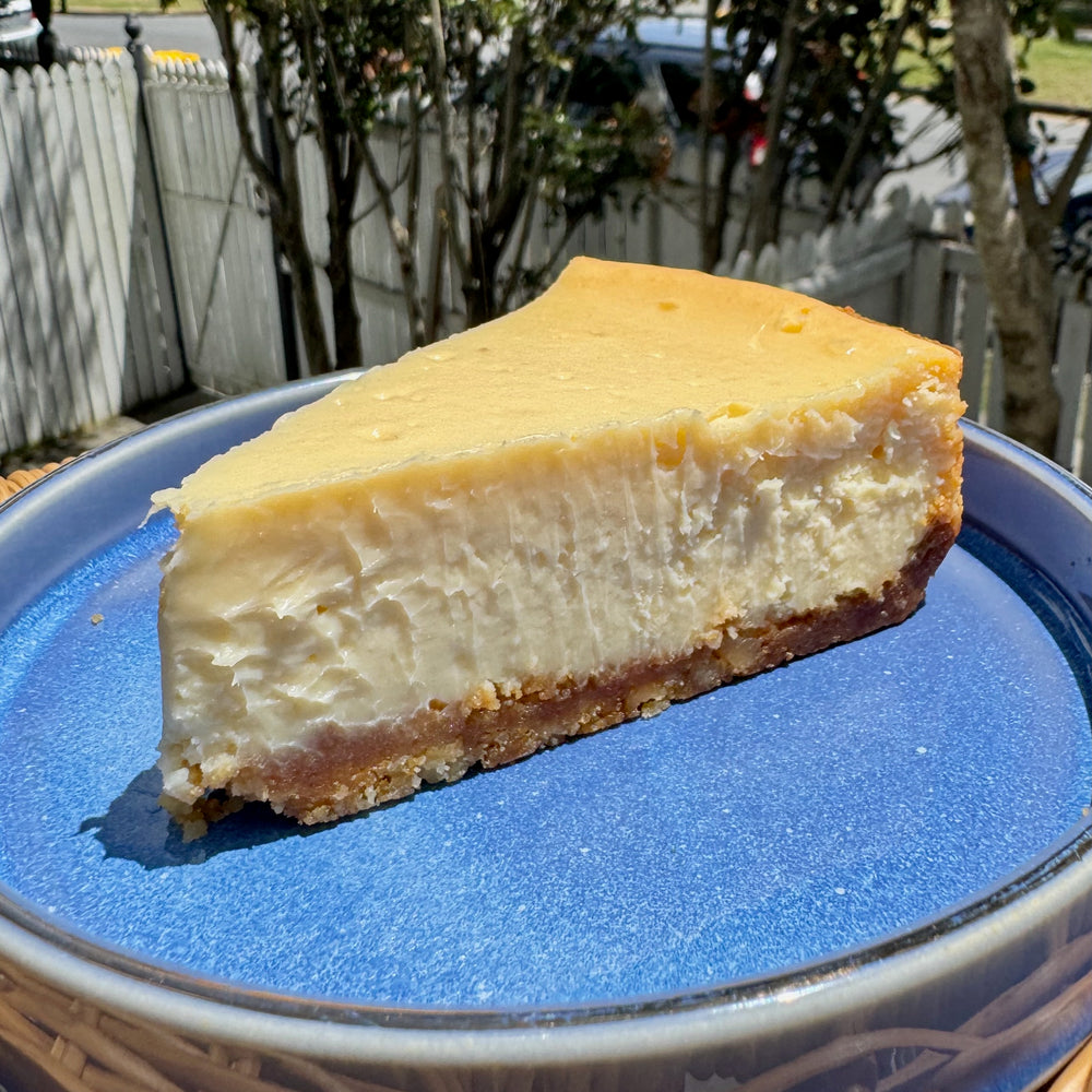 Slice of custom baked cheesecake by Montana's Table, Brisbane