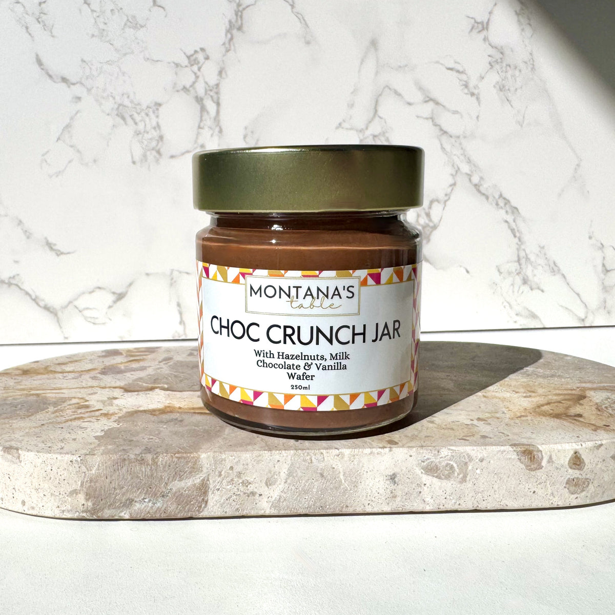 Milk Chocolate Hazelnut Crunch jar with roasted hazelnuts, Montana's Table