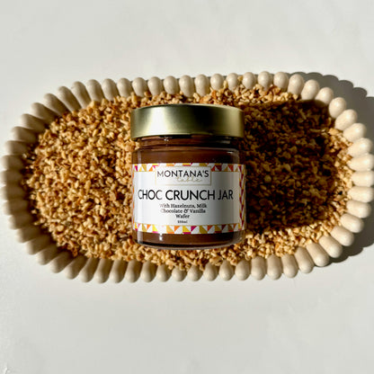 Montana's Table Milk Chocolate Hazelnut Crunch Jar styled on a decorative tray