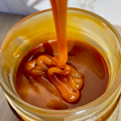 Salted Caramel Sauce drizzling from a spoon, Montana's Table