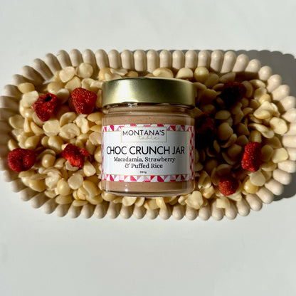 Montana's Table Strawberry Macadamia Crunch Jar styled on a decorative tray